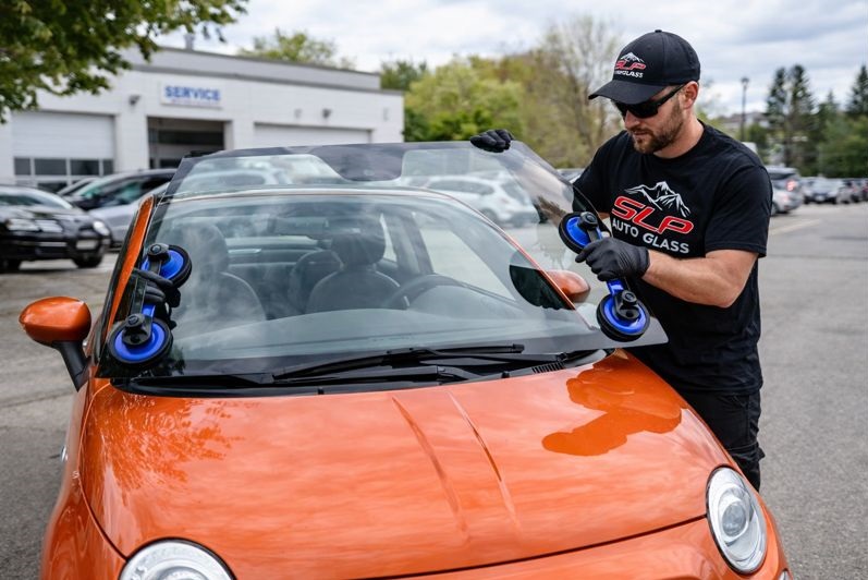 Fiat windshield replacement by SLP Auto Glass technician installing new auto glass