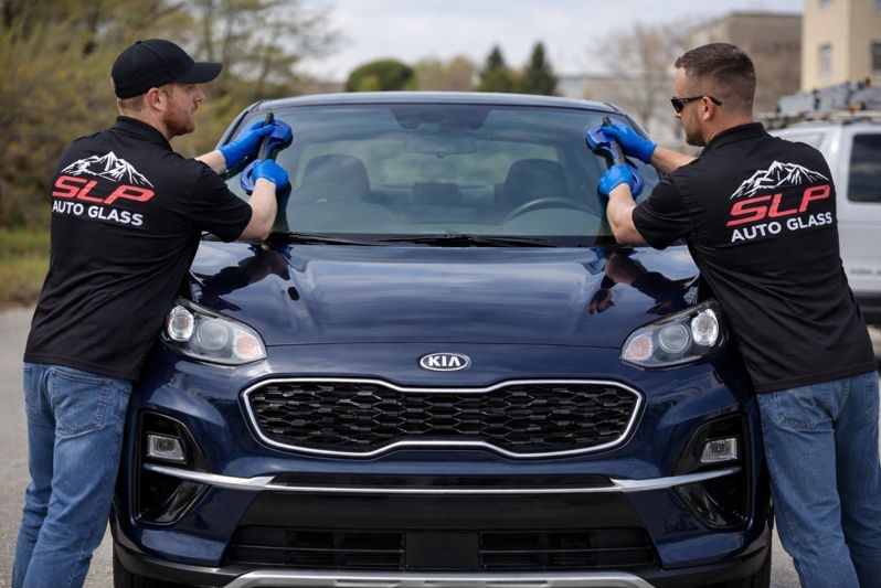 Kia Sportage windshield replacement by SLP Auto Glass mobile technicians