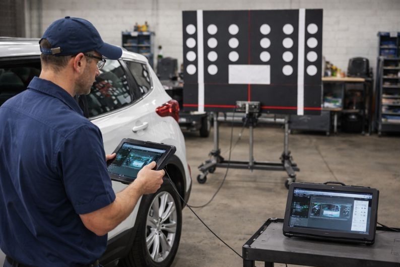 ADAS calibration service after windshield replacement performed by certified technician at SLP AutoGlass
